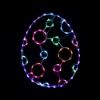 lit multicolored Poka dot lighted egg on black background