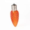 Single C9 bulb, orange, on white background