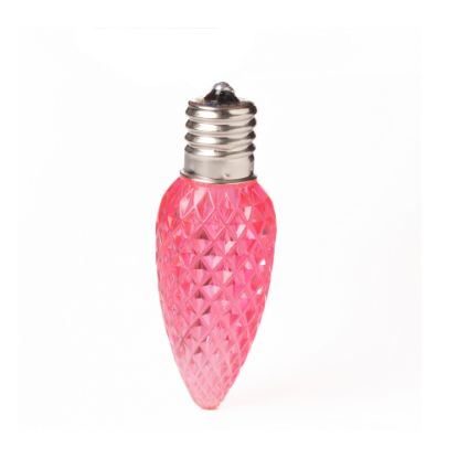 Single C9 bulb, pink, on white background