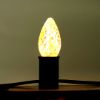 C7 Sun Warm White bulb, displayed lit
