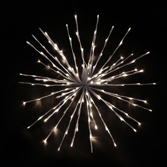 Warm white Spritzer displayed lit on a black background