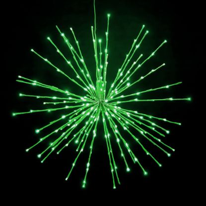 Green Spritzer displayed lit on a black background
