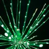 Extreme close-up of the green Spritzer displayed lit on a black background