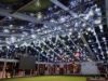 Spritzers hung on ceiling in indoor arena