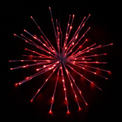 Red Spritzer displayed lit on a black background