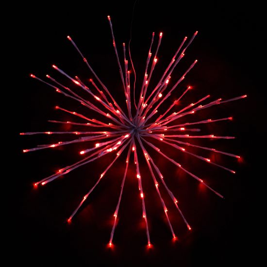 Red Spritzer displayed lit on a black background