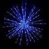 Blue Spritzer displayed lit on a black background