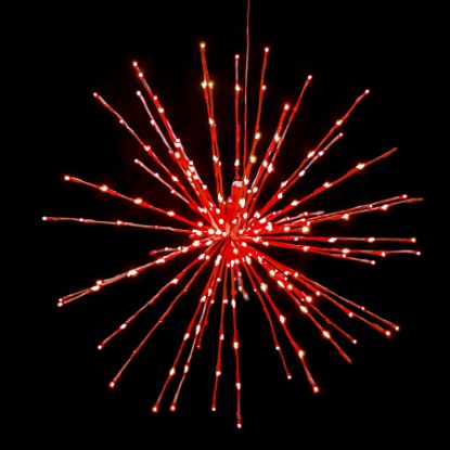Red Spritzer displayed lit on a black background