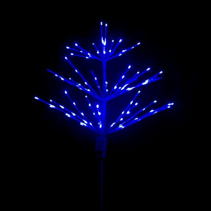 Paramount Spritzer yard stake decoration illuminated in blue against a black background.