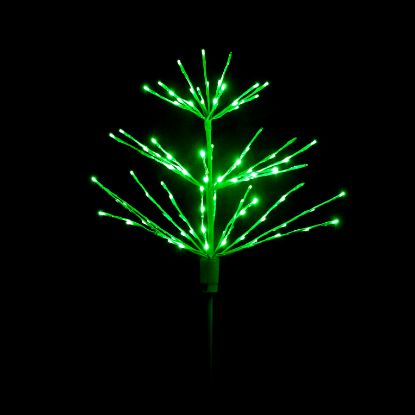 Paramount Spritzer yard stake decoration illuminated in green against a black background.
