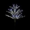 Paramount Spritzer yard stake decoration illuminated in pure white against a black background.