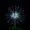 Odyssey Spritzer Red, Green, and Pure White 24" staked lit on black background