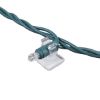 Mini adhesive clip displayed attached to a 5mm or 3mm light