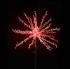 Oversized Spritzer lit red and displayed on black background