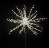 Classic white Spritzer displayed lit on a black background and mounted on a white pole