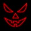 Sinister Pumpkin Face Jack-O-Lantern lit in red on black background
