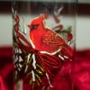 Picture of 7.75 Inch Clear Glass Cardinal & Pinecone Candle Slip Cover with Water Candle