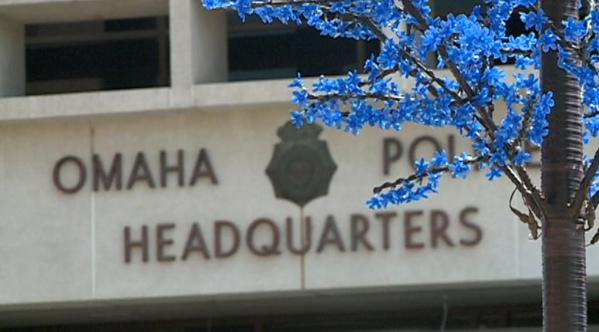 Image of Omaha Police Department headquarters with support blue tree honoring fallen officers of OPD
